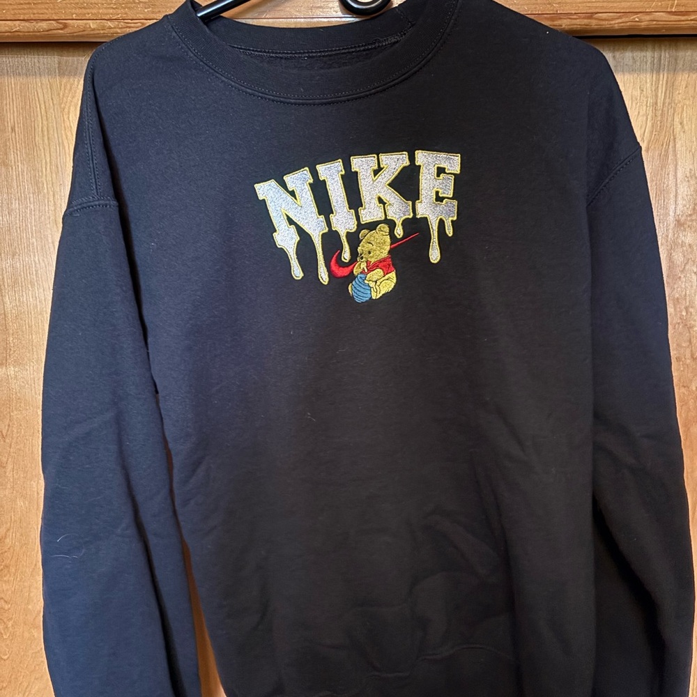 Nike Black Crewneck Sweater with Unique Logo